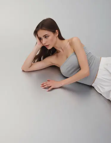 Lying on the floor with Head on Hand